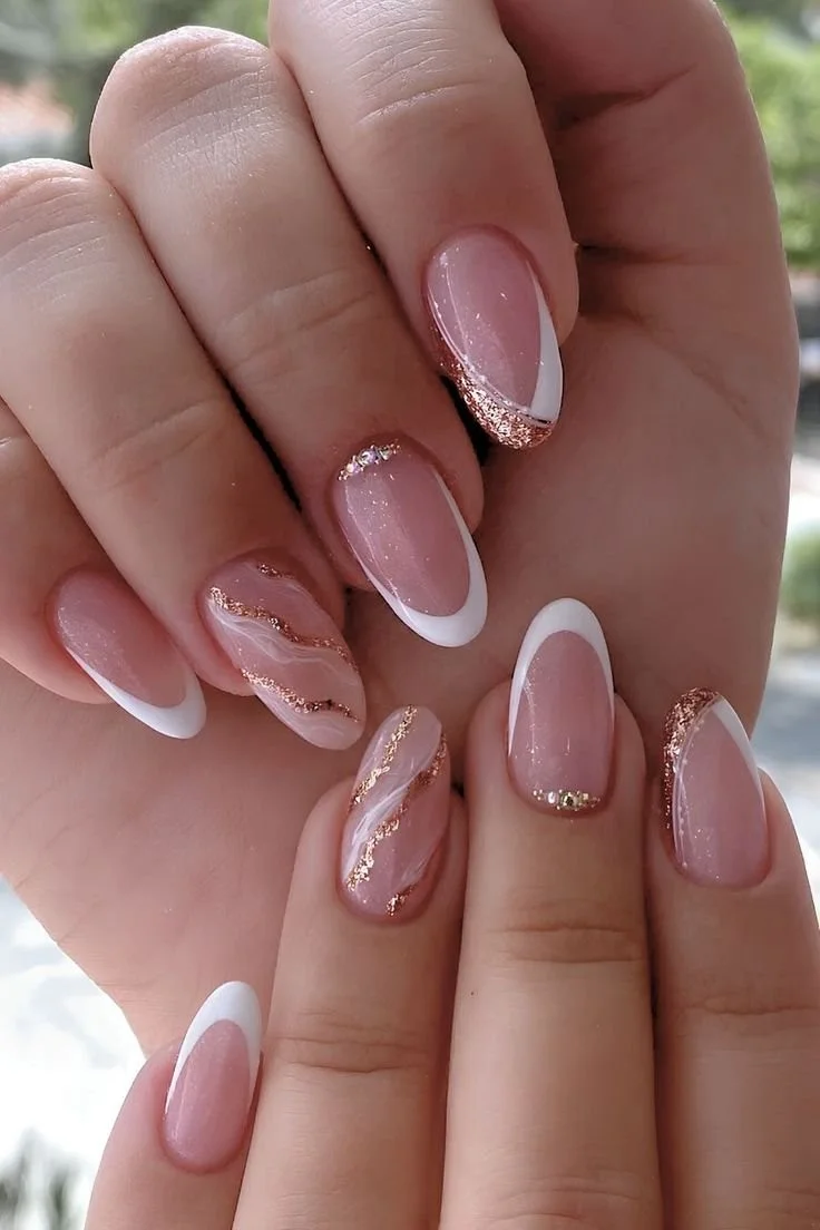 Stylish white and gold nail designs for 2025 showcasing gel and simple styles.