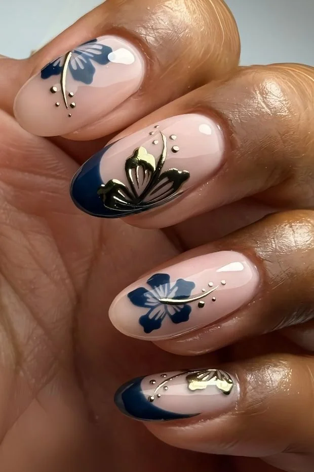 Colorful hibiscus flower nail art showcasing tropical-inspired nail designs