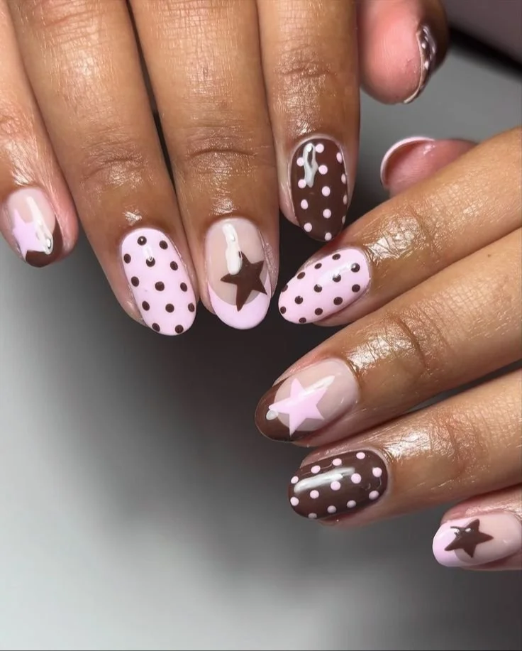 Polka dot nails design by Em G Nails, featuring autumn colors and patterns.