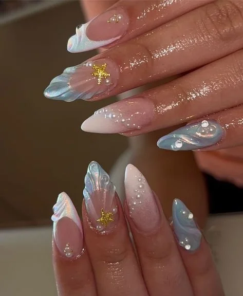 Beautiful Ocean Vibe Nails showcasing sea-inspired colors and designs.